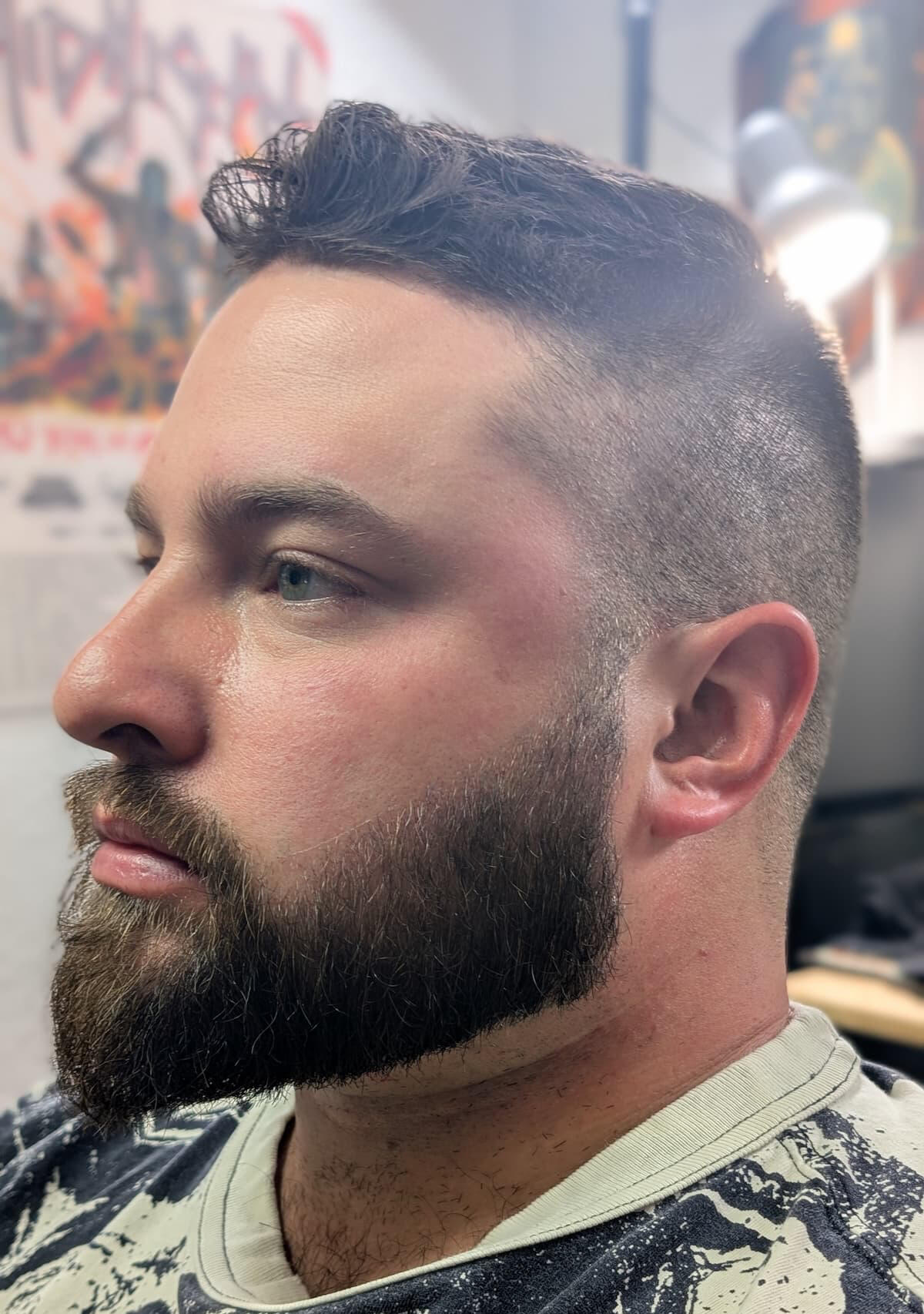 Beard Sculpt and Skin Fade by Knucklehead Barbershop Man with fresh beard sculpt and clean skin fade haircut at Knucklehead Barbershop in Idaho